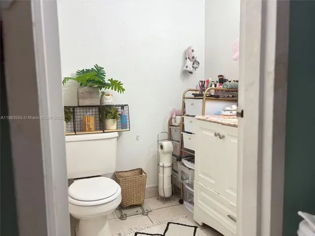 a bathroom with a toilet and a sink