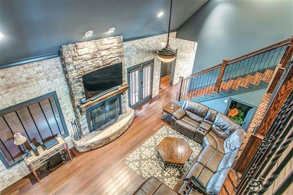 871 Franklin Road Gallatin, TN 37066 - Photo 17 of 30 a living room with furniture and a flat screen tv