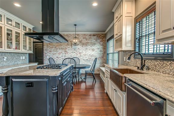 871 Franklin Road Gallatin, TN 37066 - Photo 8 of 30 a kitchen with a stove and a sink