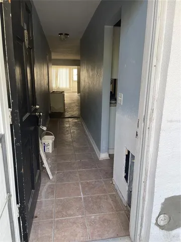 a kitchen with a stove and a microwave