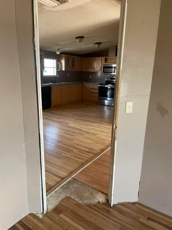 a view of kitchen and sink