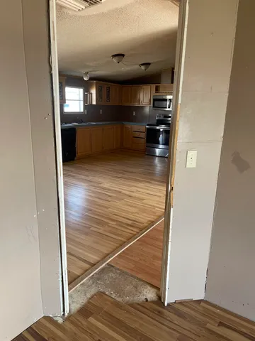 a view of kitchen and sink