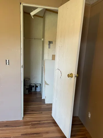 a view of a bathroom from a hallway