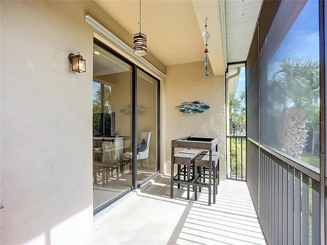 a view of a balcony with chairs