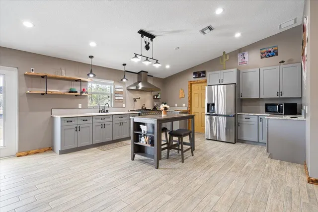 a view of a yard with palm trees