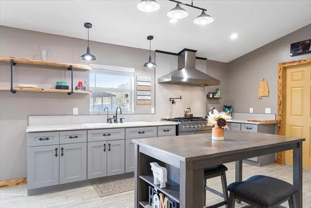 an aerial view of a house with a lake view