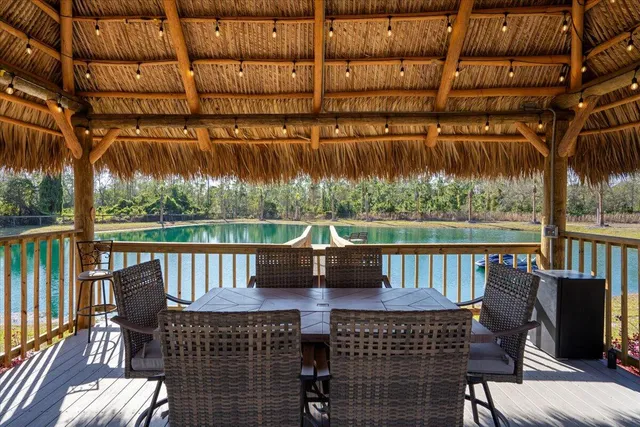 a kitchen with granite countertop a stove and a sink