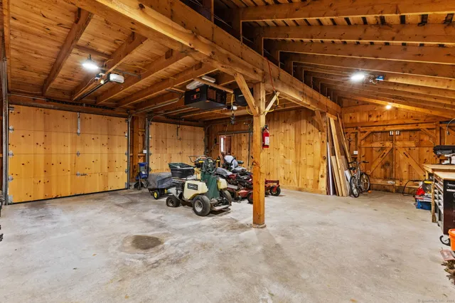 a view of a garage with a table and chairs