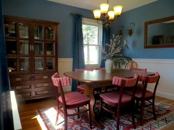 969 Allen Street Springfield, MA 01118 - Photo 9 of 21 a view of a dining room with furniture and a chandelier