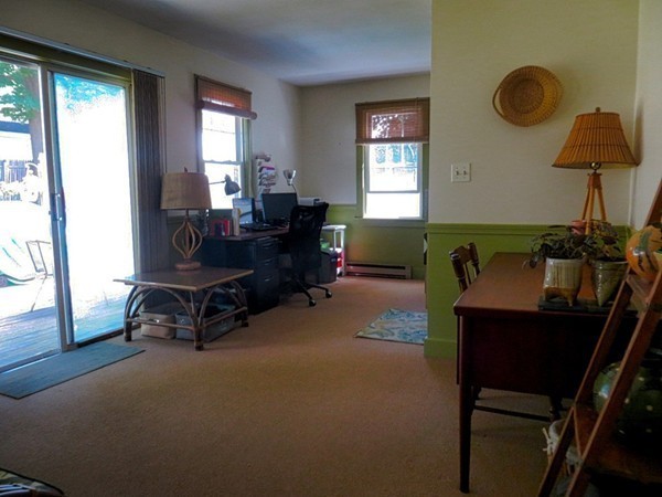 969 Allen Street Springfield, MA 01118 - Photo 10 of 21 a living room with furniture and a window
