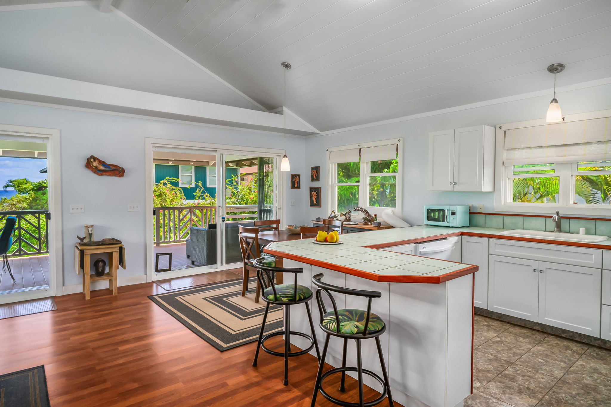 8244 A Elepaio Road Kekaha, HI 96752 - Photo 10 of 21 a view of a dining room with furniture window and wooden floor