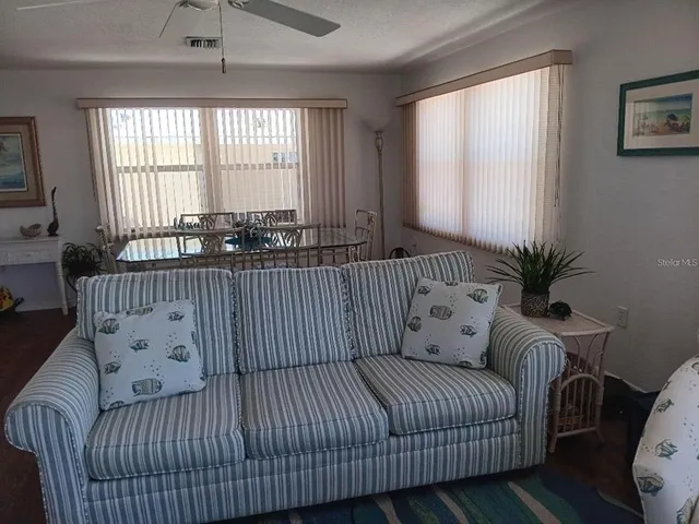 a view of a porch with furniture