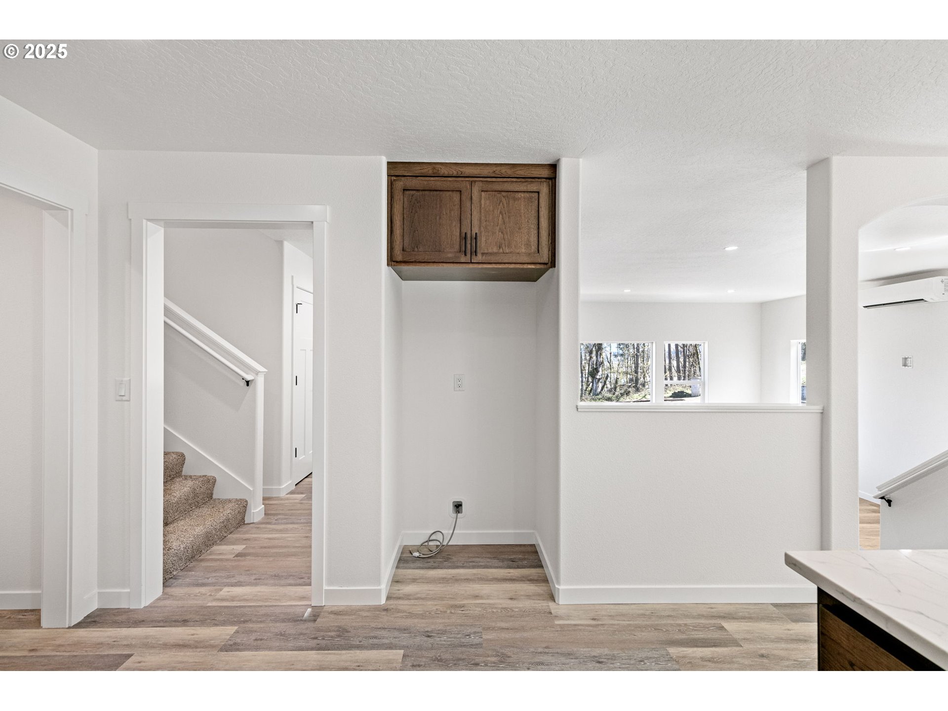65 Bangle Court Cottage Grove, OR 97424 - Photo 16 of 44 a view of a hallway with paintings on the wall