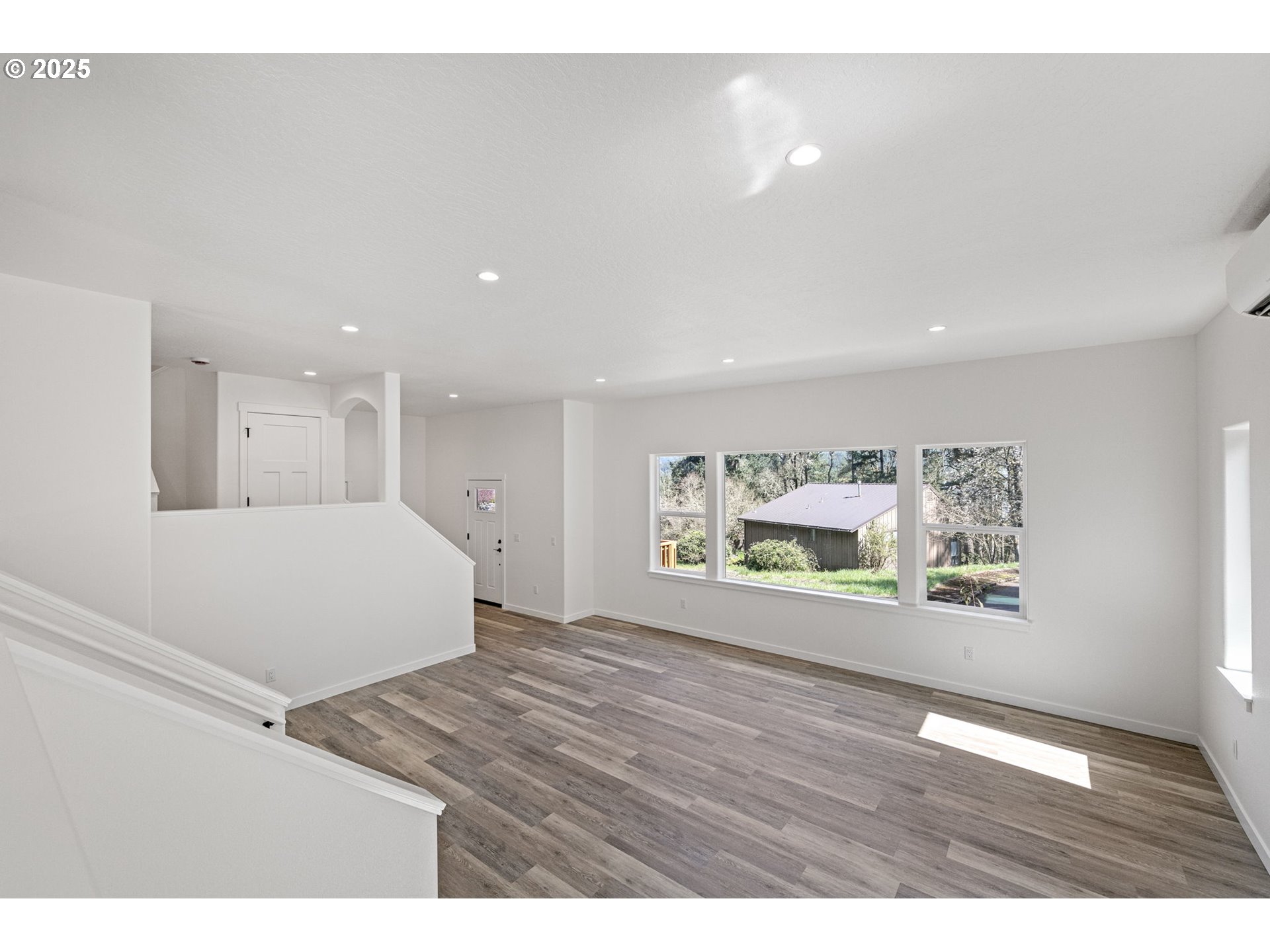 65 Bangle Court Cottage Grove, OR 97424 - Photo 17 of 44 a view of room with window and wooden floor