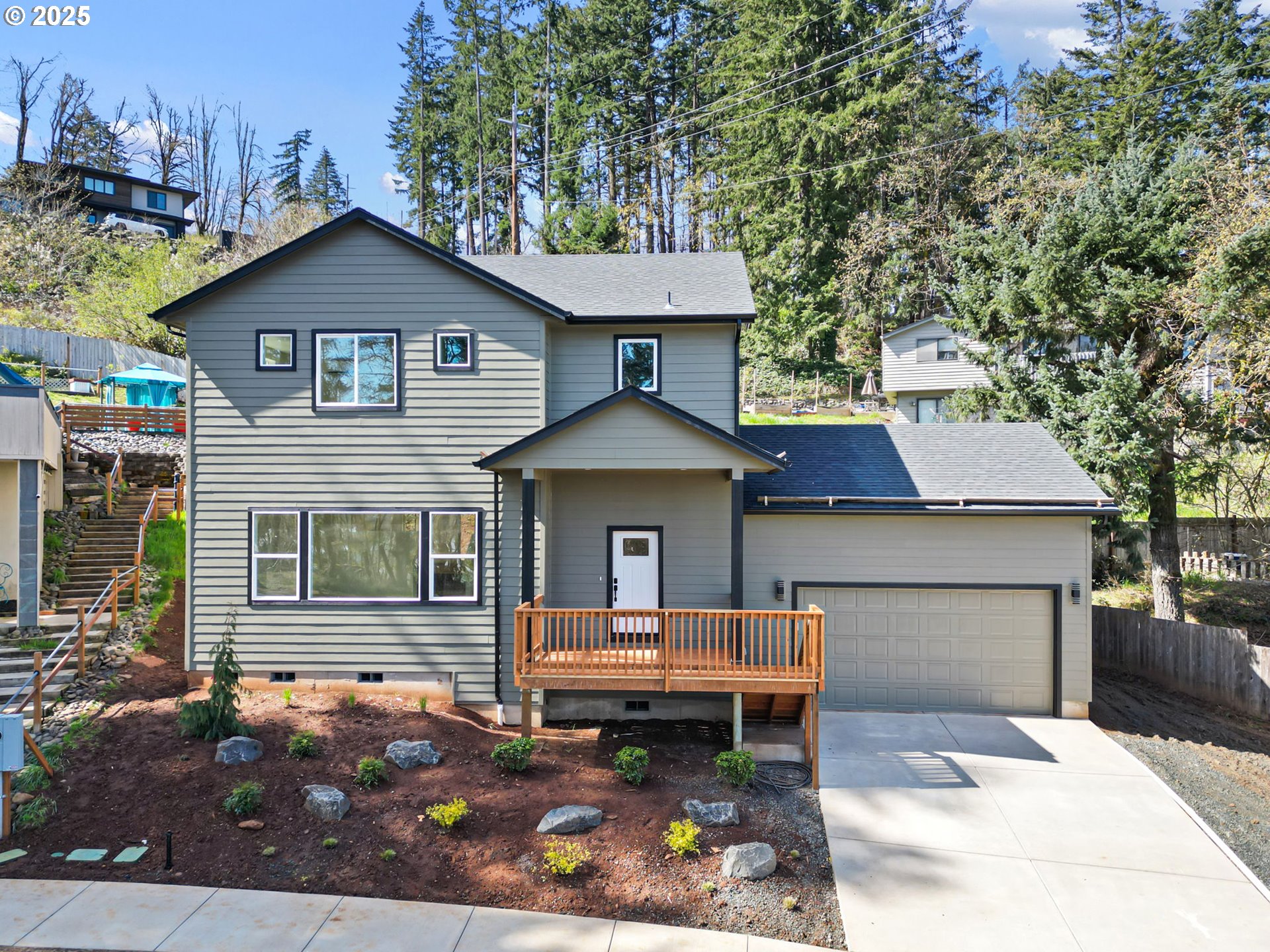 65 Bangle Court Cottage Grove, OR 97424 - Photo 38 of 44 a front view of a house with a yard