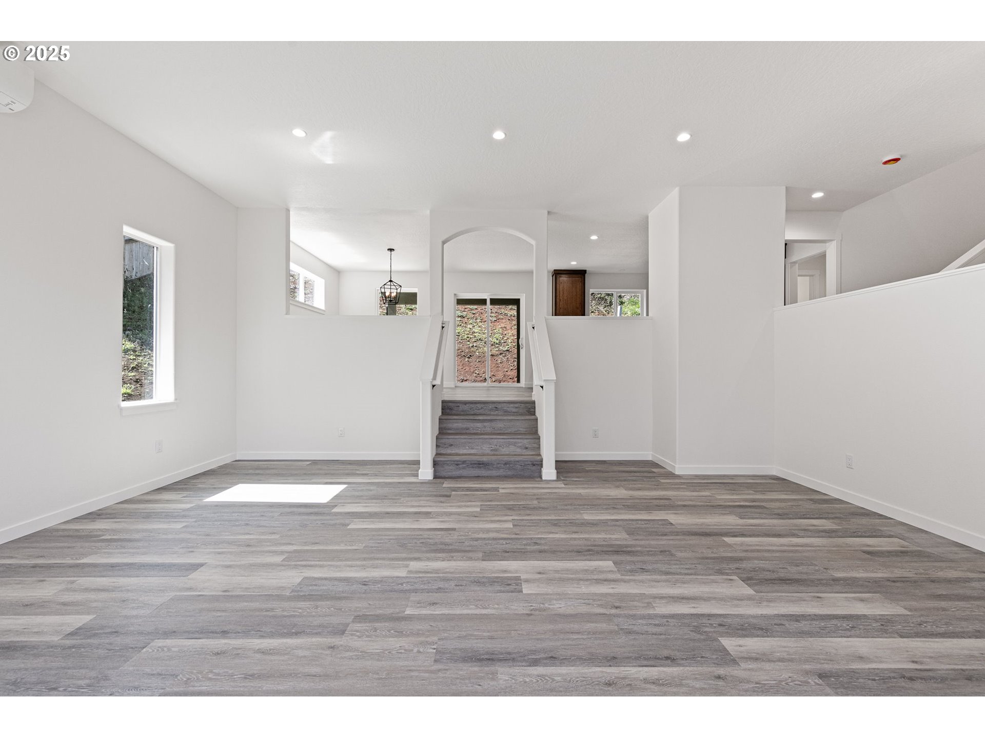65 Bangle Court Cottage Grove, OR 97424 - Photo 6 of 44 a view of empty room with wooden floor