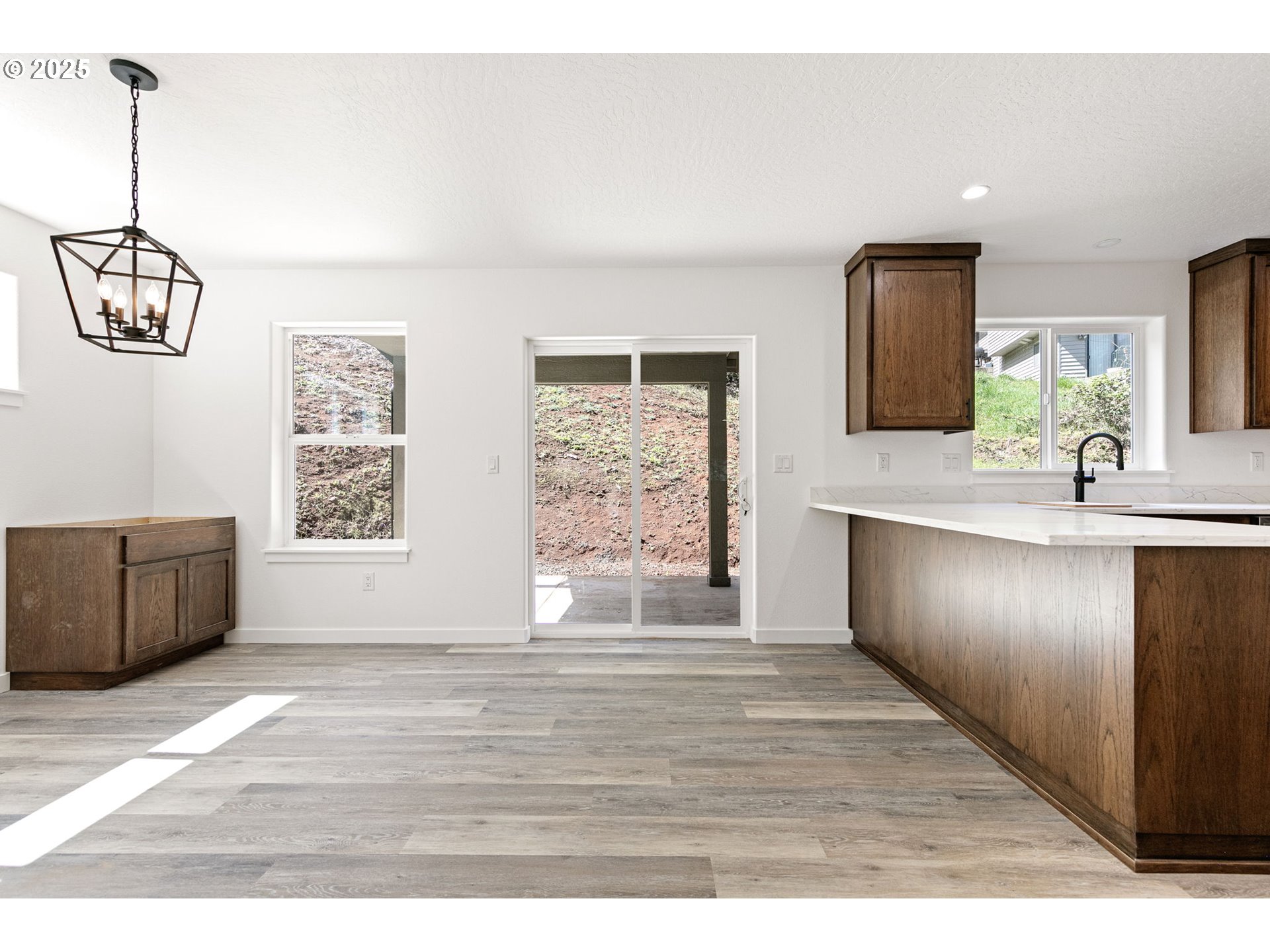 65 Bangle Court Cottage Grove, OR 97424 - Photo 7 of 44 a view of kitchen and windows