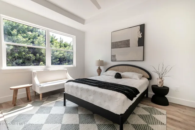 a bathroom with a double vanity sink and mirror