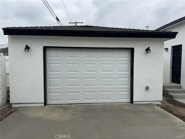 an empty room with a wooden door
