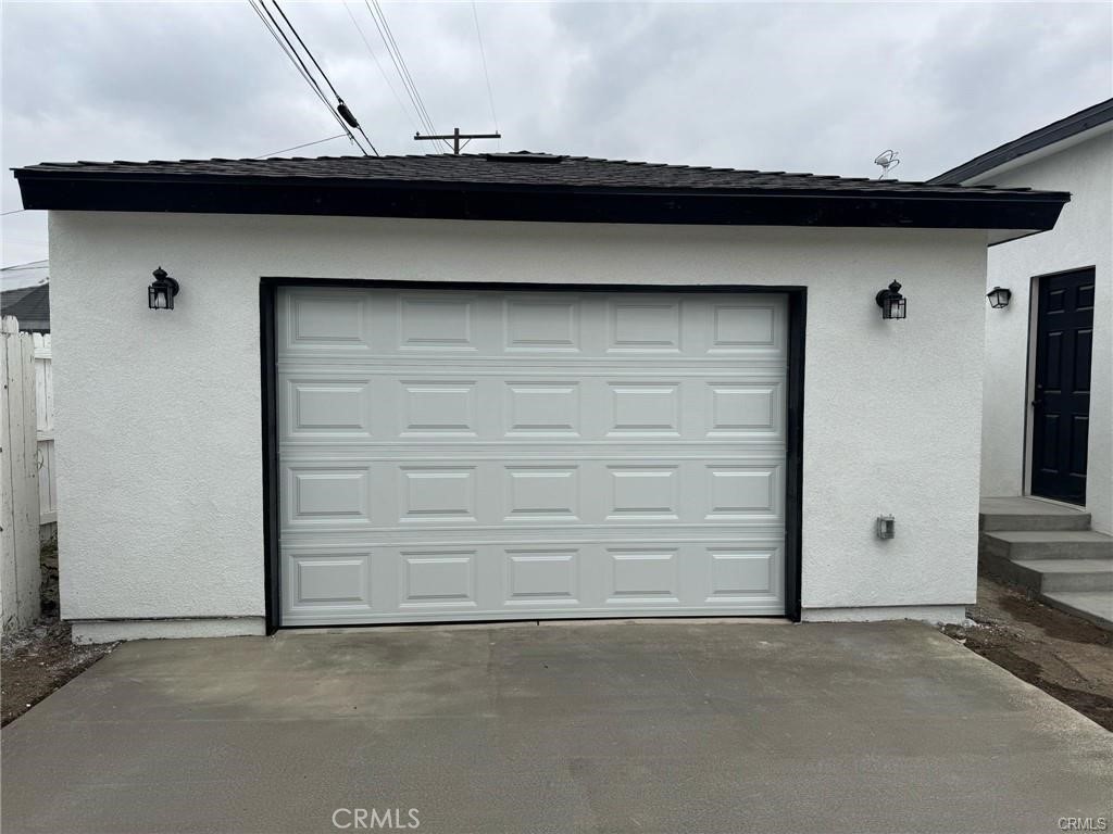 411 West Plum Street Compton, CA 90222 - Photo 13 of 14 an empty room with a wooden door