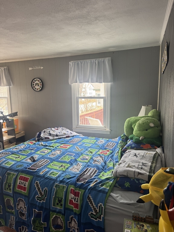 27 Pleasant Street, Unit A Templeton, MA 01468 - Photo 12 of 15 a bedroom with two bed and a window