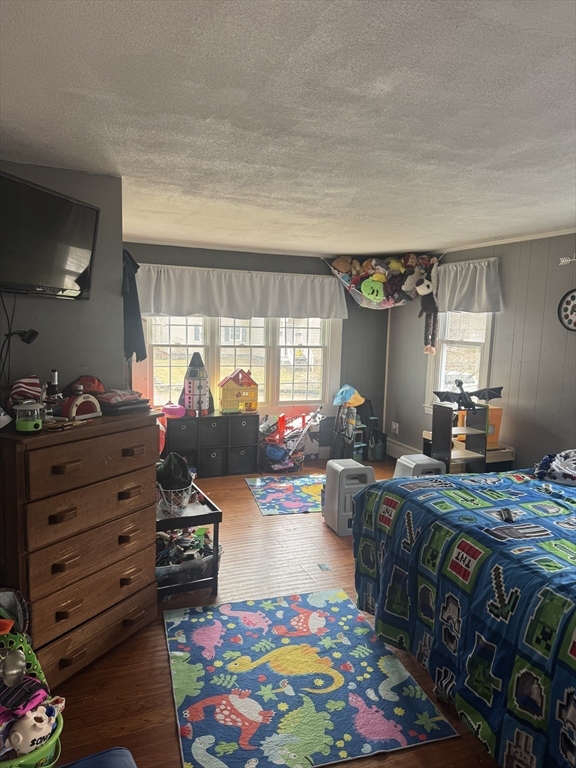 27 Pleasant Street, Unit A Templeton, MA 01468 - Photo 13 of 15 a bed room with furniture and a window