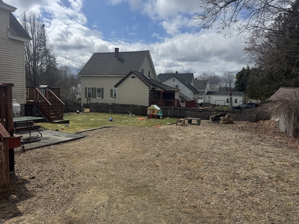 27 Pleasant Street, Unit A Templeton, MA 01468 - Photo 15 of 15 a view of a house with backyard
