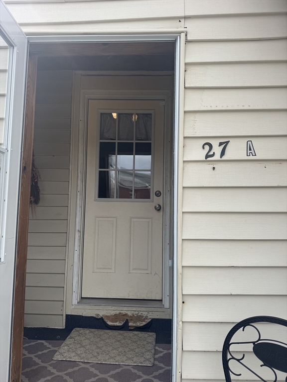 27 Pleasant Street, Unit A Templeton, MA 01468 - Photo 2 of 15 a view of front door and a window