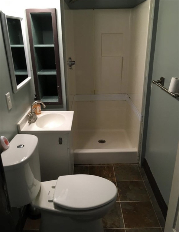 27 Pleasant Street, Unit A Templeton, MA 01468 - Photo 6 of 15 a bathroom with a sink and a mirror