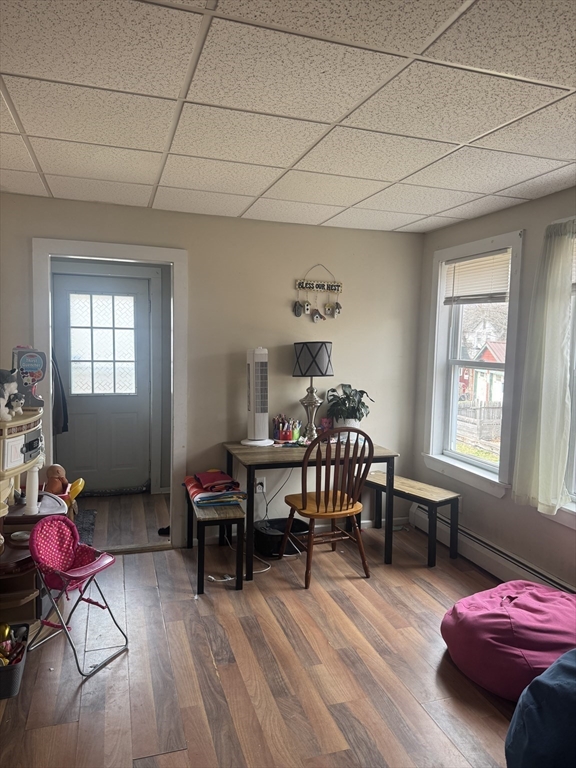 27 Pleasant Street, Unit A Templeton, MA 01468 - Photo 9 of 15 a living room with furniture and wooden floor