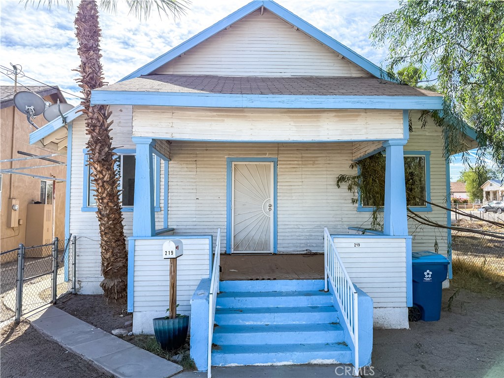 a front view of a house with wooden floor
