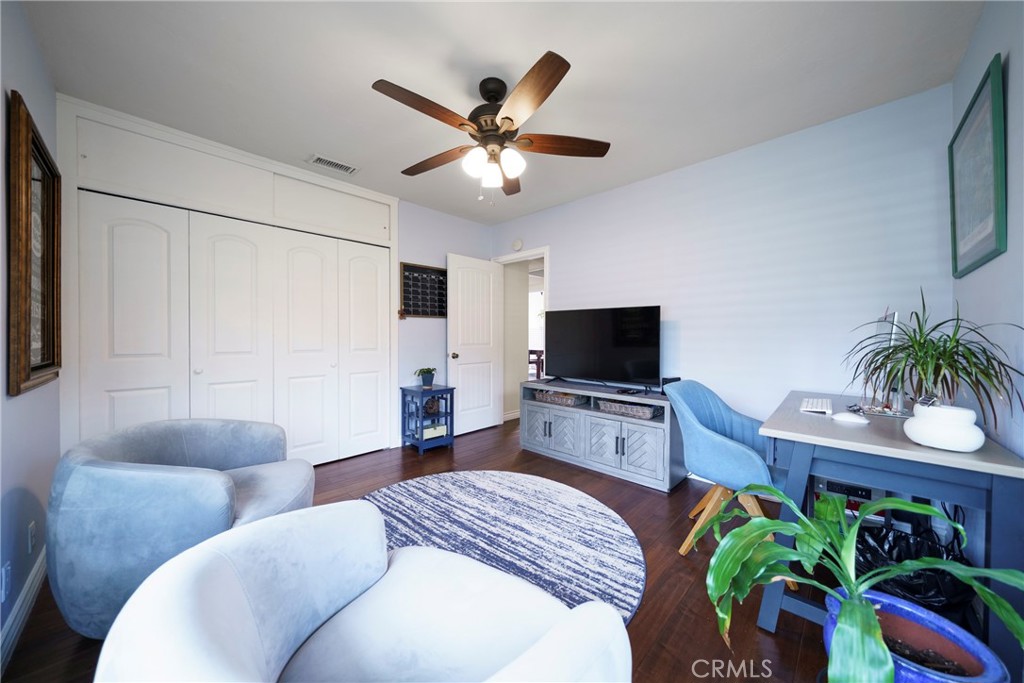 6937 Broadway Whittier, CA 90606 - Photo 12 of 27 a bedroom with furniture and a flat screen tv