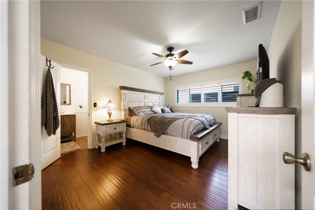 6937 Broadway Whittier, CA 90606 - Photo 13 of 27 a bedroom with a bed couch and a window