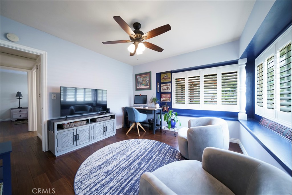 6937 Broadway Whittier, CA 90606 - Photo 17 of 27 a living room with furniture and a flat screen tv