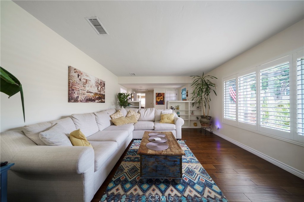 6937 Broadway Whittier, CA 90606 - Photo 5 of 27 a living room with furniture and a large window