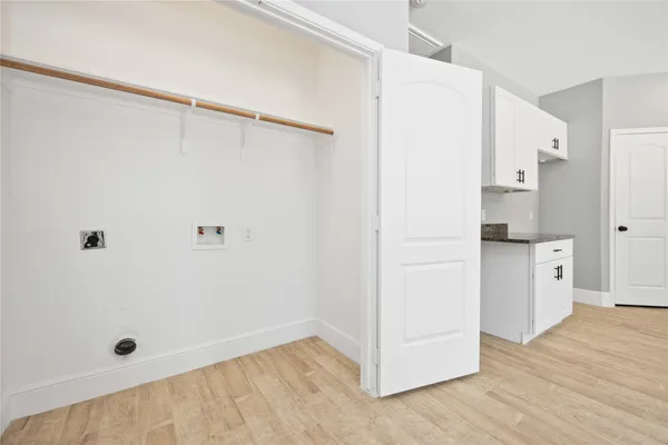a bathroom with a shower and a sink