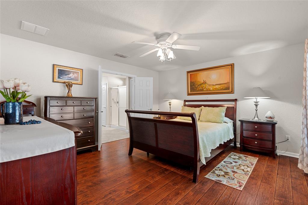 4683 Southwest 40th Place Ocala, FL 34474 - Photo 17 of 43 a living room with furniture and a flat screen tv