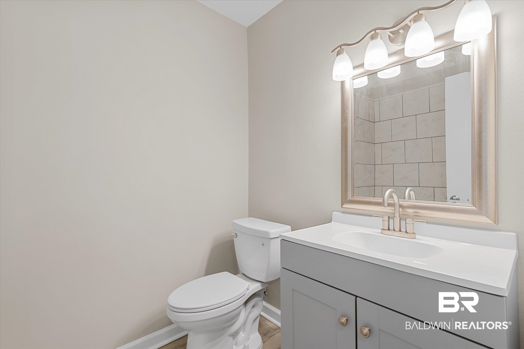 5015 Golfway Drive Eight Mile, AL 36613 - Photo 18 of 31 Bathroom with vanity and toilet