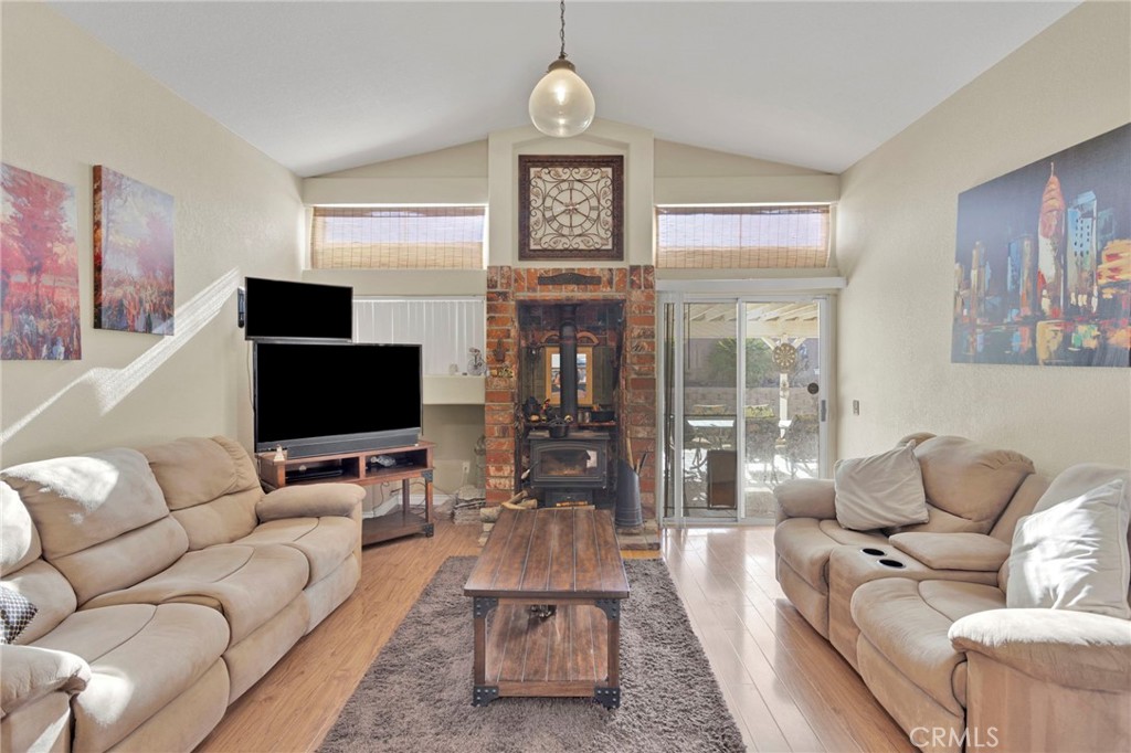 14405 Cedar Street Hesperia, CA 92344 - Photo 13 of 48 a living room with furniture and a flat screen tv