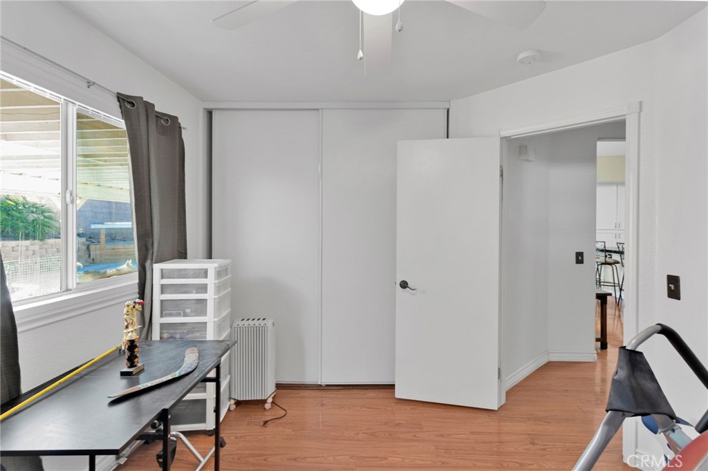 14405 Cedar Street Hesperia, CA 92344 - Photo 25 of 48 a view of a workspace with furniture and a window