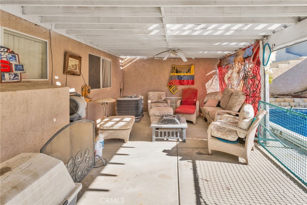 14405 Cedar Street Hesperia, CA 92344 - Photo 36 of 48 a very nice looking room with a large window