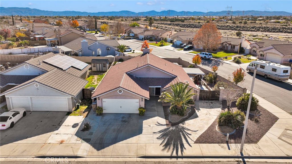14405 Cedar Street Hesperia, CA 92344 - Photo 39 of 48 an aerial view of residential houses with outdoor space