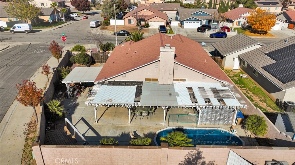 14405 Cedar Street Hesperia, CA 92344 - Photo 44 of 48 an aerial view of a house with swimming pool and patio