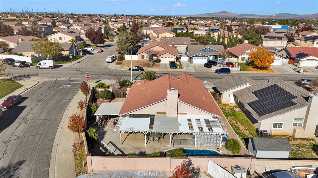 14405 Cedar Street Hesperia, CA 92344 - Photo 45 of 48 an aerial view of residential houses with outdoor space