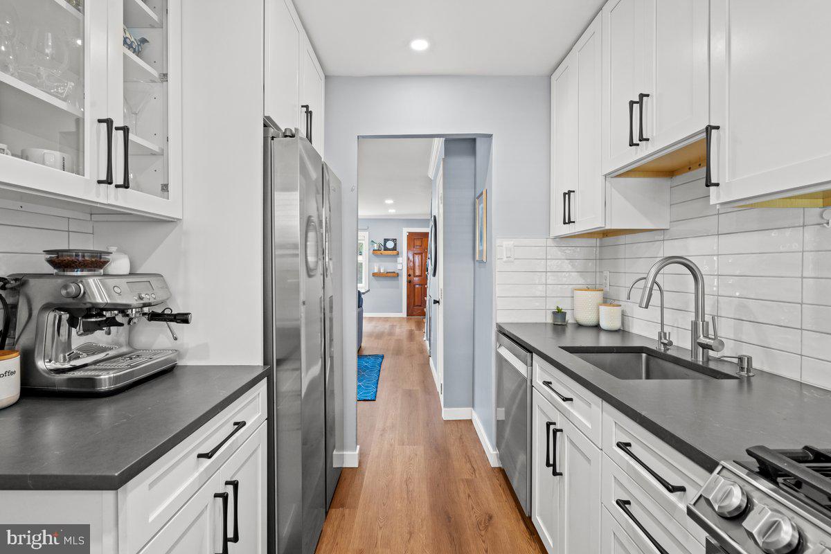 707 Four Mile Road Alexandria, VA 22305 - Photo 8 of 19 Kitchen opens to living/dining rooms