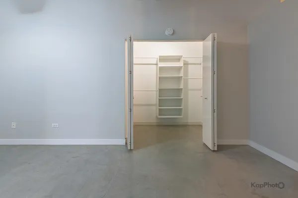 a view of an empty walk in closet