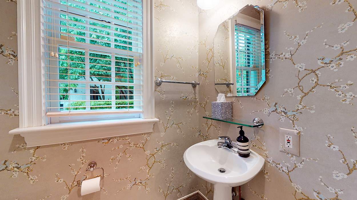 3816 Dover Road Durham, NC 27707 - Photo 17 of 30 a bathroom with a sink and a mirror