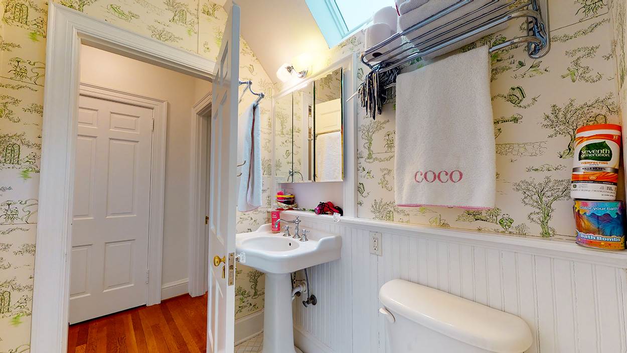3816 Dover Road Durham, NC 27707 - Photo 22 of 30 a bathroom with a sink toilet and shower