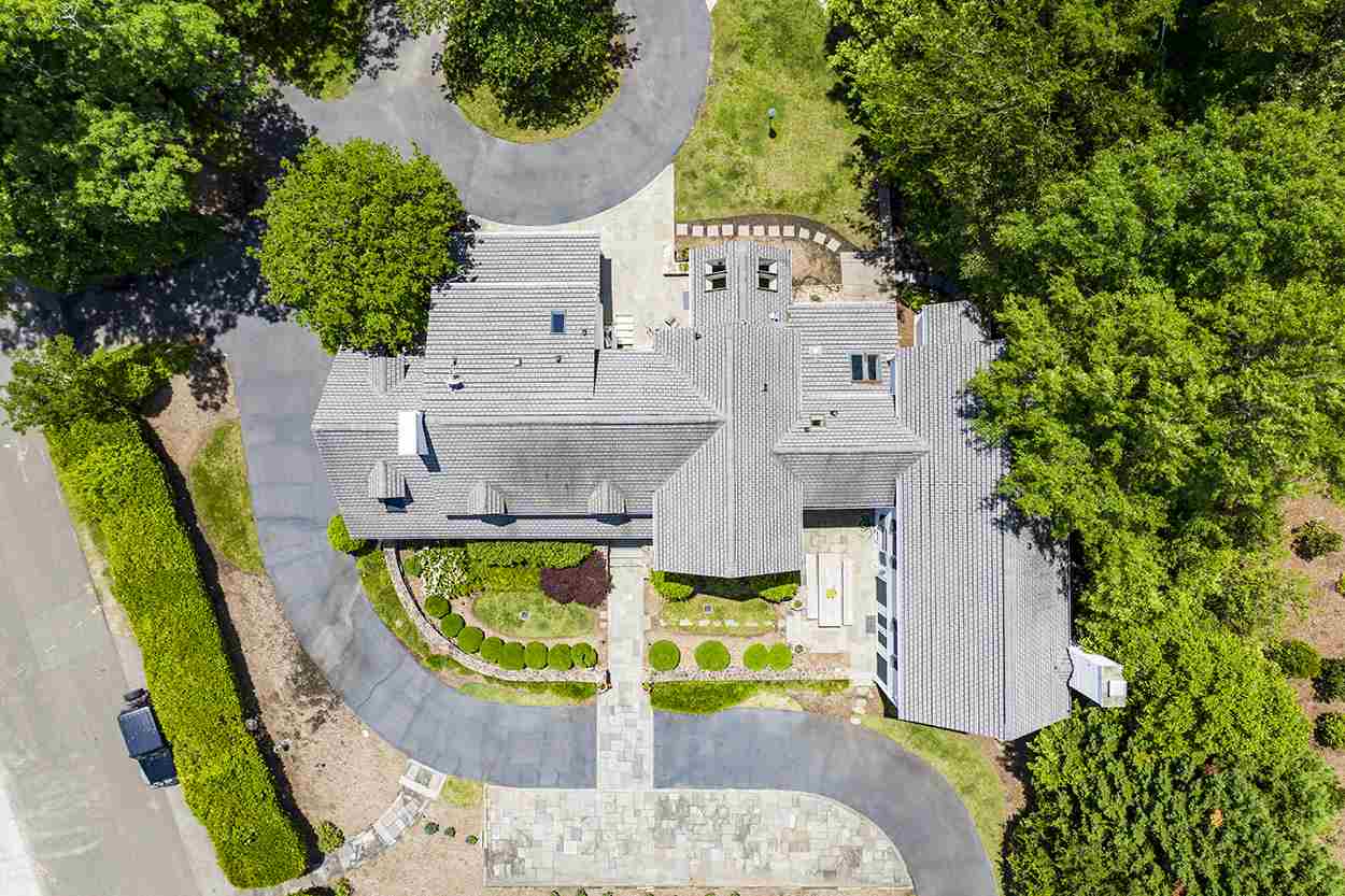 3816 Dover Road Durham, NC 27707 - Photo 3 of 30 an aerial view of a house with swimming pool and large trees