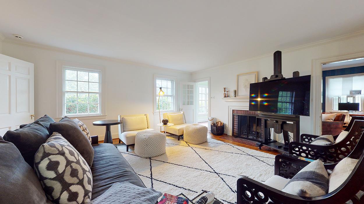 3816 Dover Road Durham, NC 27707 - Photo 6 of 30 a living room with furniture and a flat screen tv
